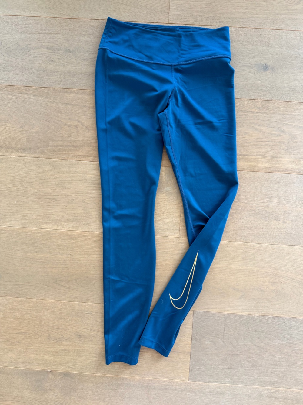 Nike dri-fit Royal Blue Performance Leggings with gold Swoosh